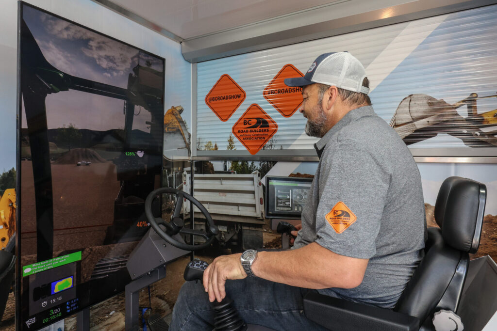 BCRB The RoadShow - Man using excavator simulator