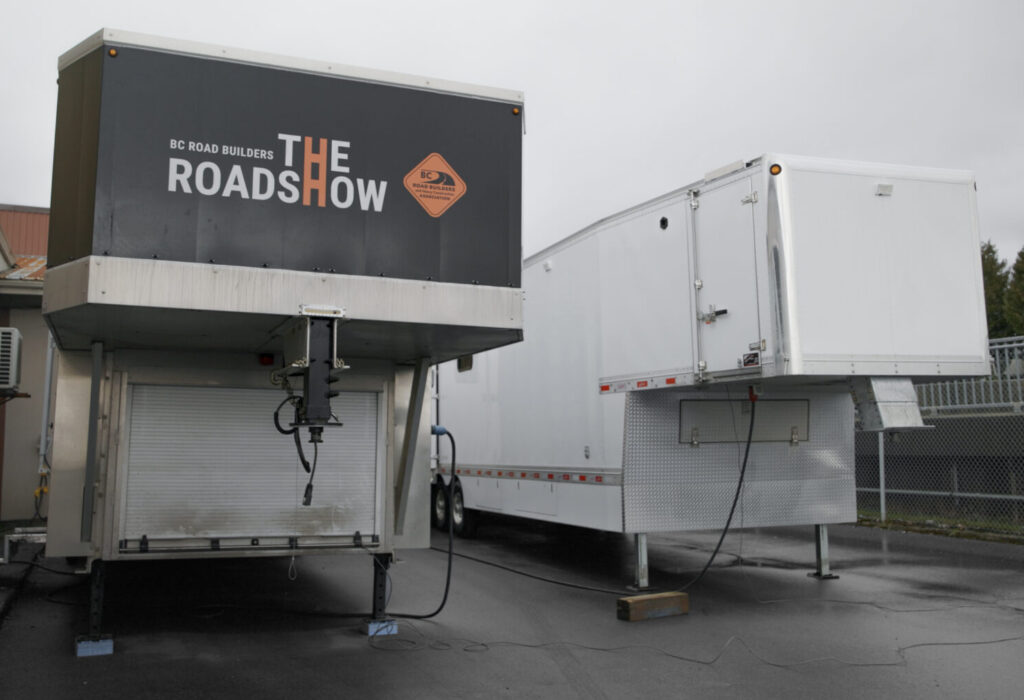 RoadShow trailer and RoadShow Operator Classroom trailer side by side