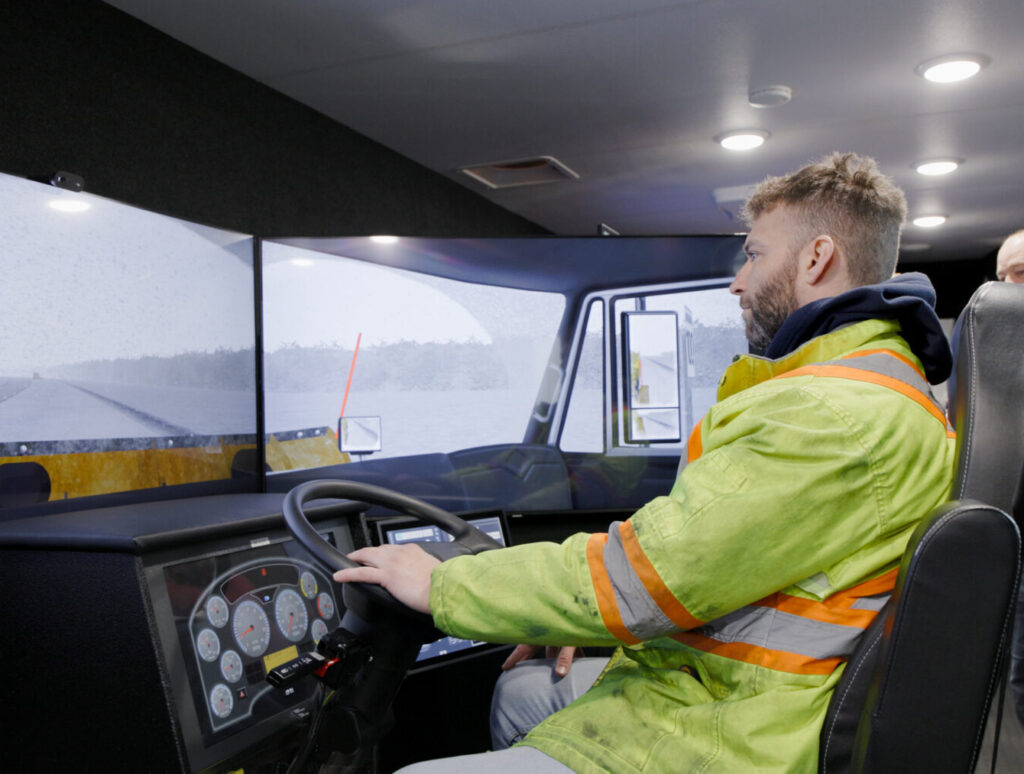 Man operator Virage snowplow simulator